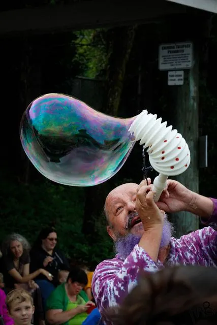 A long bubble stretching from a wand